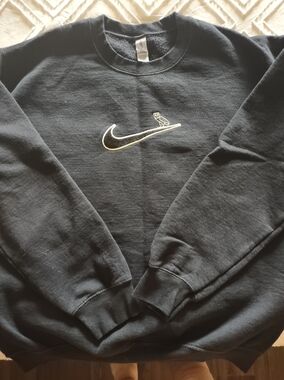 Gildan Black Crewneck Sweatshirt with Embroidered Gold Nike Swoosh